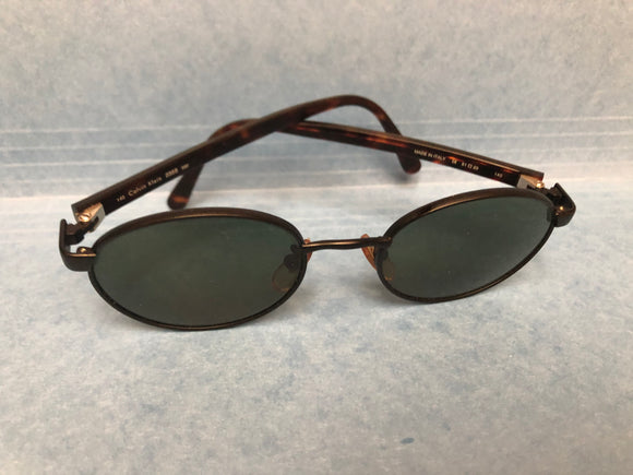 New Vintage CALVIN KLEIN Sunglasses 235S (Amber and Black) 